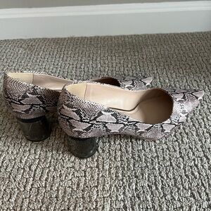 Super adorable snakeskin shoes with clear block heel